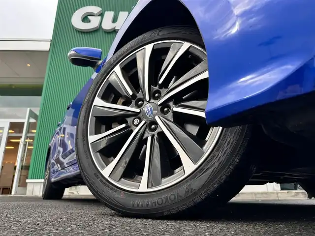 スバル レヴォーグ 1．8STIスポーツ EX 宮城県 2021(令3)年 3.4万km WRブルーパール アイサイトXテクノロジー/・渋滞時ハンズオフ/・渋滞時発進アシスト/・アクティブレーンチェンジアシスト/・ドライバー異常時対応/・カーブ前抑制機能/・料金所前速度制限/アイサイトコアテクノロジー/・プリクラッシュブレーキ/・AT誤発進抑制機能/・追従機能付きクルーズコントロール/・ツーリングアシスト/・車線逸脱抑制/アイサイトセイフティプラス/・運転支援テクノロジー/・視界拡張テクノロジー/4WD/STI12.3インチフル液晶メーター/純正11.6インチディスプレイナビ/・Bluetooth/・Apple CarPlay/Android Auto/・地デジTV/フロント/サイド/バックカメラ/サイドシルスポイラー/リアスポイラー/STIロゴ入り大型マフラーカッター/STIブラックツートンレザーシート/全席シートヒーター/左右独立温度調整フルオートエアコン/ハンズフリーバックドア/ステアリング連動フルLEDヘッドランプ/コムテック前後ドライブレコーダー/STIロゴ入ステアリング/STIロゴ入り高触感革巻きステアリング/STIロゴ入りフロアマット/保証書