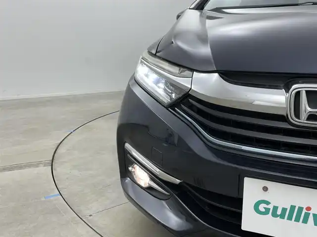 ホンダ シャトル ハイブリッド X 岡山県 2016(平28)年 2.5万km ミッドナイトブルービームM 純正ナビ/・FM/AM/Bluetooth/フルセグ/CD/DVD/バックカメラ/衝突軽減ブレーキ/クルーズコントロール/ハーフレザーシート/前後ドライブレコーダー/ビルトインETC/LEDヘッドライト/・フォグライト/パドルシフト/スマートキー2本/純正フロアマット/純正15インチアルミ