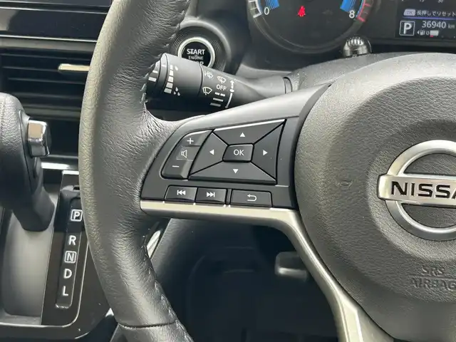 日産 デイズ HWS G ターボ プロパイロットED 滋賀県 2022(令4)年 3.7万km ブラック ガソリン（ハイブリッド）/2WD(FF)/CVT/９インチ純正ナビ【MM321D-L】/(FM/AM/CD/DVD/フルセグ)/アラウンドビューモニター/バックカメラ/前ドライブレコーダー/ETC/プロパイロット/・レーンキープアシスト	/・プリクラッシュブレーキアシスト	/・踏み間違い防止アシスト	/・ブレーキアシスト	/・フロント＆バックソナー/・標識検知機能	/電動格納ミラー/電動パーキング/ブレーキホールド/アイドリングストップ/ディスプレイ付自動防眩式ルームミラー/革巻きステアリング/ステアリングスイッチ/オートライト/LEDヘッドライト/フロントフォグ/ヘッドライトレベリング/フルオートエアコン/プッシュスタート/スマートキー/純正フロアマット/ドアバイザー/USB端子