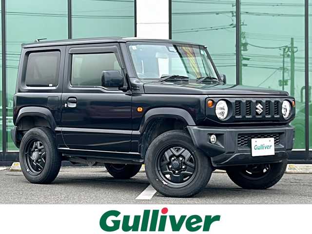 スズキ ジムニー XL 福岡県 2019(令1)年 1.6万km ブルーイッシュブラックパール3 背面タイヤ/社外7インチSDナビ/【AM/FM/CD/DVD/Bluetooth/フルセグTV】/前方ドライブレコーダー【/トランスファーレバー/ヒルディセントコントロール/デュアルセンサーブレーキサポート/車線逸脱警報/先行車発進お知らせ機能/標識認識機能/盗難防止装置/横滑り防止装置/レザー調シートカバー/光軸調整ダイヤル/D/N席シートヒーター/純正16インチAW/純正フロアマット/AAC/電動格納ミラー/保証書/取扱説明書/ナビ取扱説明書/スペアキー×1