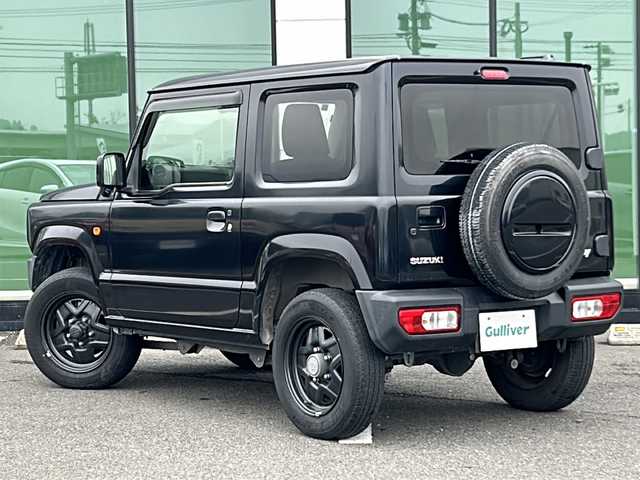 スズキ ジムニー XL 福岡県 2019(令1)年 1.6万km ブルーイッシュブラックパール3 背面タイヤ/社外7インチSDナビ/【AM/FM/CD/DVD/Bluetooth/フルセグTV】/前方ドライブレコーダー【/トランスファーレバー/ヒルディセントコントロール/デュアルセンサーブレーキサポート/車線逸脱警報/先行車発進お知らせ機能/標識認識機能/盗難防止装置/横滑り防止装置/レザー調シートカバー/光軸調整ダイヤル/D/N席シートヒーター/純正16インチAW/純正フロアマット/AAC/電動格納ミラー/保証書/取扱説明書/ナビ取扱説明書/スペアキー×1
