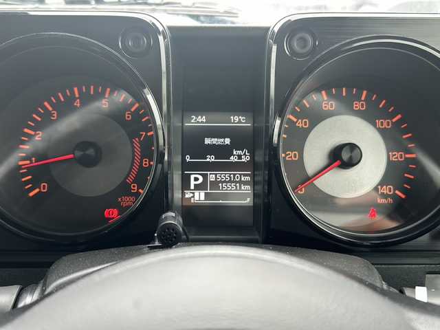 スズキ ジムニー XL 福岡県 2019(令1)年 1.6万km ブルーイッシュブラックパール3 背面タイヤ/社外7インチSDナビ/【AM/FM/CD/DVD/Bluetooth/フルセグTV】/前方ドライブレコーダー【/トランスファーレバー/ヒルディセントコントロール/デュアルセンサーブレーキサポート/車線逸脱警報/先行車発進お知らせ機能/標識認識機能/盗難防止装置/横滑り防止装置/レザー調シートカバー/光軸調整ダイヤル/D/N席シートヒーター/純正16インチAW/純正フロアマット/AAC/電動格納ミラー/保証書/取扱説明書/ナビ取扱説明書/スペアキー×1