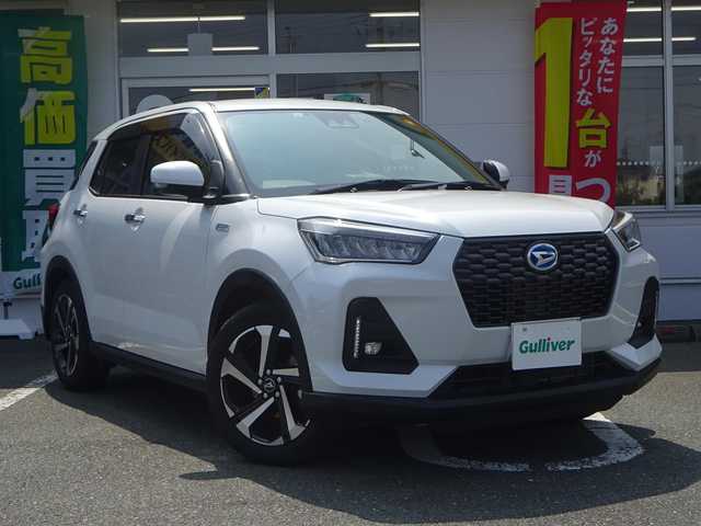 ダイハツ ロッキー プレミアム G HEV 静岡県 2023(令5)年 2.6万km シャイニングホワイトパール ワンオーナー/記録簿R6.R7/運転席助手席シートヒーター/取説・保証書/禁煙車/純正9インチナビ/（CD/DVD/SD/BT/USB/フルセグTV）/走行中TV可（スイッチ有）/ステアリングリモコン/プッシュスタート/バックカメラ/ナビ連動純正Fドライブレコーダー/ビルトインETC/電子パーキング/前後コーナーセンサー/ハーフレザーシート/LEDヘッドライト/スマートアシスト/レーダークルーズコントロール/純正マット・バイザー/純正17インチAW