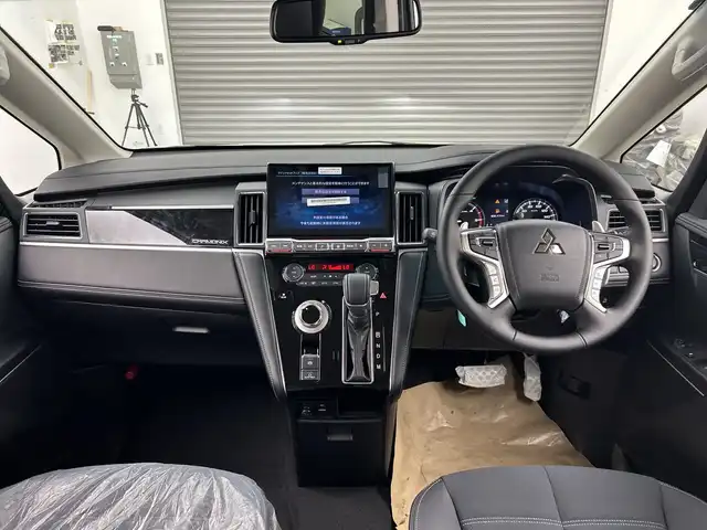 三菱 デリカＤ：５ シャモニー 三重県 2025(令7)年 0.1千km パール /登録済未使用車//アルパインナビ（フルセグ・Bluetooth・CD・DVD・USB・HDMI・AppleCarPlay・AndroidAuto）//バックカメラ//両側パワースライドドア//パワーバックドア//ブラインドスポットモニター//ステアリングヒーター//運転席パワーシート//前席シートヒーター//パドルシフト//電子パーキング