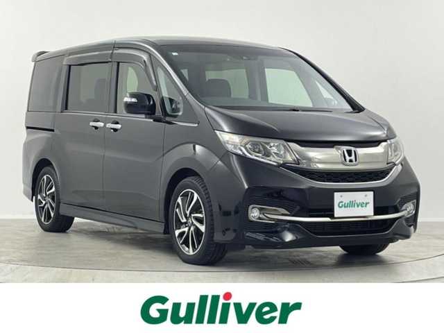ホンダ ステップワゴン スパーダ クルスピセンシング 埼玉県 2016(平28)年 6.9万km プレミアムスパークルブラックパール 純正9型ナビ　Ｂｌｕｅｔｏｏｔｈ　バックカメラ　純正１１型後席モニター　両側パワースライドドア　シートヒーター　レーダークルーズコントロール　ハーフレザーシート　ビルトインＥＴＣ　レーンアシスト