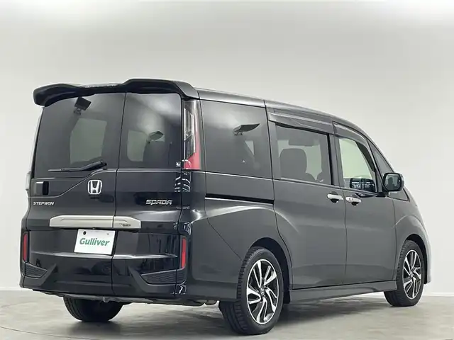ホンダ ステップワゴン スパーダ クルスピセンシング 埼玉県 2016(平28)年 6.9万km プレミアムスパークルブラックパール 純正9型ナビ　Ｂｌｕｅｔｏｏｔｈ　バックカメラ　純正１１型後席モニター　両側パワースライドドア　シートヒーター　レーダークルーズコントロール　ハーフレザーシート　ビルトインＥＴＣ　レーンアシスト