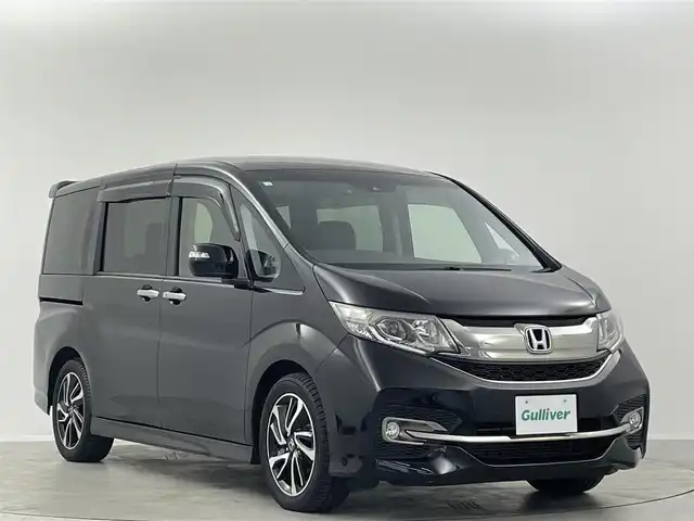 ホンダ ステップワゴン スパーダ クルスピセンシング 埼玉県 2016(平28)年 6.9万km プレミアムスパークルブラックパール 純正9型ナビ　Ｂｌｕｅｔｏｏｔｈ　バックカメラ　純正１１型後席モニター　両側パワースライドドア　シートヒーター　レーダークルーズコントロール　ハーフレザーシート　ビルトインＥＴＣ　レーンアシスト