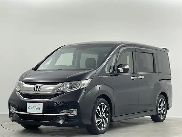 ホンダ ステップワゴン スパーダ クルスピセンシング 埼玉県 2016(平28)年 6.9万km プレミアムスパークルブラックパール 純正9型ナビ　Ｂｌｕｅｔｏｏｔｈ　バックカメラ　純正１１型後席モニター　両側パワースライドドア　シートヒーター　レーダークルーズコントロール　ハーフレザーシート　ビルトインＥＴＣ　レーンアシスト