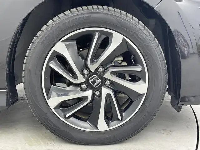 ホンダ ステップワゴン スパーダ クルスピセンシング 埼玉県 2016(平28)年 6.9万km プレミアムスパークルブラックパール 純正9型ナビ　Ｂｌｕｅｔｏｏｔｈ　バックカメラ　純正１１型後席モニター　両側パワースライドドア　シートヒーター　レーダークルーズコントロール　ハーフレザーシート　ビルトインＥＴＣ　レーンアシスト