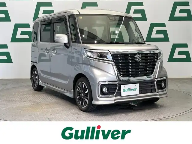 スズキ スペーシア カスタム HYBRID XS 鹿児島県 2020(令2)年 2.1万km スチールシルバーM 社外ディスプレイオーディオ(FM/AM/CD/DVD/BT)/プッシュスタート/両側パワスラ/バックカメラ/アイドリングストップ/ハーフレザーシート/D席シートヒーター/純正フロアマット/純正アルミホイール/オートライト/ABS/ESP/DSBS/レーンキープアシスト/後方コーナーセンサー/イモビライザーシステム/スマートキー/取扱説明書/保証書