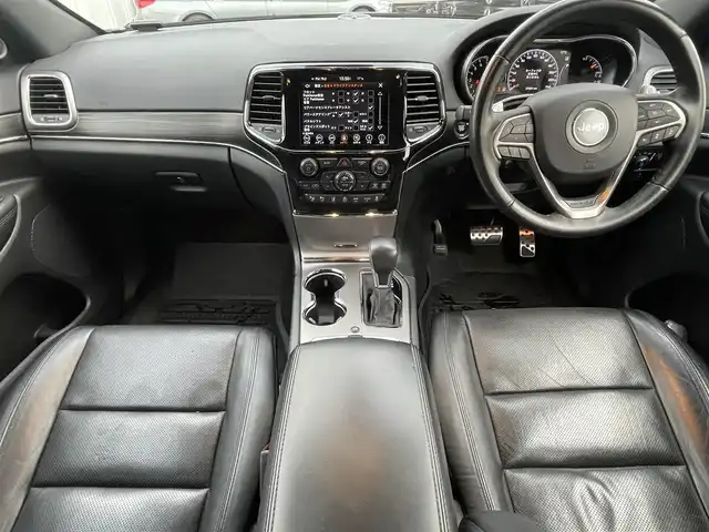 クライスラー・ジープ ジープ グランドチェロキー LTD 静岡県 2021(令3)年 2.8万km ブリリアントブラッククリスタル SRT8エンジンフード/20インチメッキ調アルミホイール/UconnectナビフルセグTVCarplay　Bluetooth/フロントサイドバックカメラ/ブラックレザーシートシートヒーター/ベンチレーションシート/サイドステップ/パワーテールゲート/レインセンサー/メッキパーツ各所/ブラッククロームマフラーカッター/衝突軽減ブレーキ　レーンセンス/ACC ブラインドスポットモニター/前後ドライブレコーダー（フロント360度）/リヤガラスフィルム施工/ローダウン