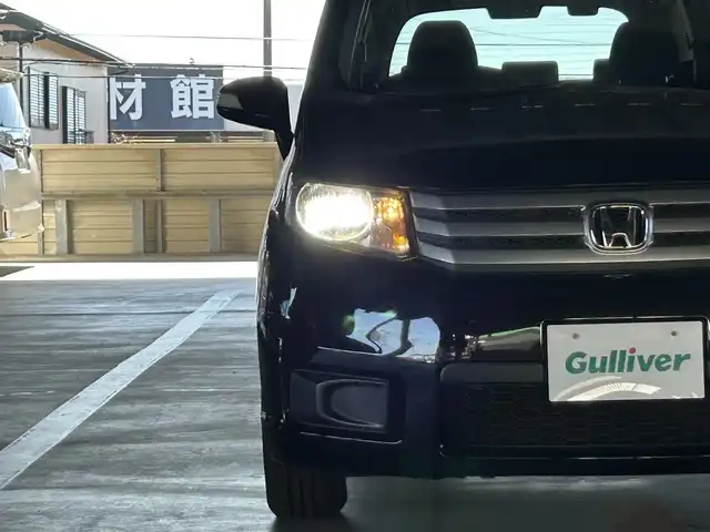 ホンダ フリード スパイク G ジャストセレクション+ 静岡県 2014(平26)年 5.9万km プレミアムスパークルブラックパール 純正ＧＡＴＨＥＲＳナビ／ＤＶＤ再生／ＢＴオーディオ／フルセグＴＶ／ドラレコ/	ディスチャージヘッドライト（オートライトコントロール付）/	ドアミラーウィンカー/	パワースライドドア(リア左側)＋スライドドア・イージークローザー(リア両側)/	フルオートエアコン/	セキュリティアラーム/	ＶＳＡ(ＡＢＳ＋ＴＣＳ＋横すべり抑制)＆ヒルスタートアシスト