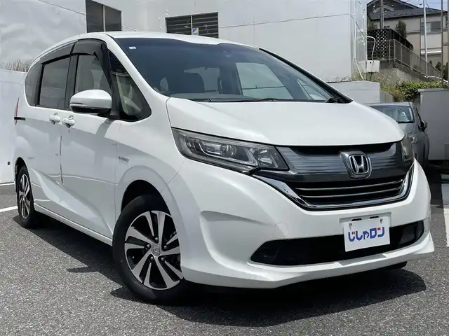 ホンダ フリード ハイブリット G ホンダセンシング 千葉県 2018(平30)年 11.1万km ホワイトオーキッドパール (株)IDOMが運営する【じしゃロン八千代店】の自社ローン専用車両になります。/こちらは現金またはオートローンご利用時の価格です。自社ローンご希望の方は別途その旨お申付け下さい/安全運転支援システム『ホンダセンシング』/両側パワースライドドア/クルーズコントロール/バックカメラ/Bluetoothオーディオ対応ナビ