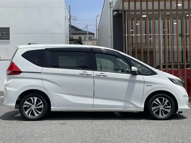 ホンダ フリード ハイブリット G ホンダセンシング 千葉県 2018(平30)年 11.1万km ホワイトオーキッドパール (株)IDOMが運営する【じしゃロン八千代店】の自社ローン専用車両になります。/こちらは現金またはオートローンご利用時の価格です。自社ローンご希望の方は別途その旨お申付け下さい/安全運転支援システム『ホンダセンシング』/両側パワースライドドア/クルーズコントロール/バックカメラ/Bluetoothオーディオ対応ナビ