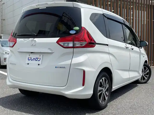 ホンダ フリード ハイブリット G ホンダセンシング 千葉県 2018(平30)年 11.1万km ホワイトオーキッドパール (株)IDOMが運営する【じしゃロン八千代店】の自社ローン専用車両になります。/こちらは現金またはオートローンご利用時の価格です。自社ローンご希望の方は別途その旨お申付け下さい/安全運転支援システム『ホンダセンシング』/両側パワースライドドア/クルーズコントロール/バックカメラ/Bluetoothオーディオ対応ナビ