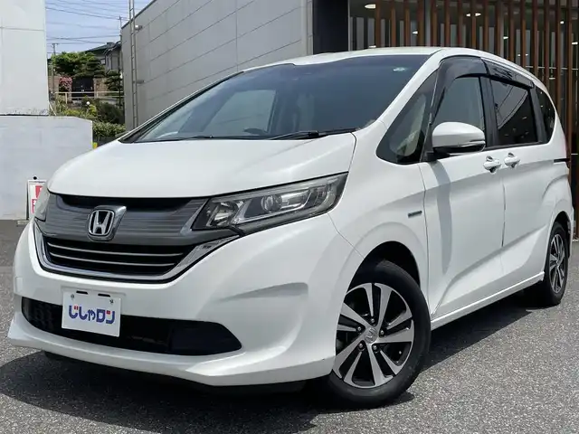 ホンダ フリード ハイブリット G ホンダセンシング 千葉県 2018(平30)年 11.1万km ホワイトオーキッドパール (株)IDOMが運営する【じしゃロン八千代店】の自社ローン専用車両になります。/こちらは現金またはオートローンご利用時の価格です。自社ローンご希望の方は別途その旨お申付け下さい/安全運転支援システム『ホンダセンシング』/両側パワースライドドア/クルーズコントロール/バックカメラ/Bluetoothオーディオ対応ナビ