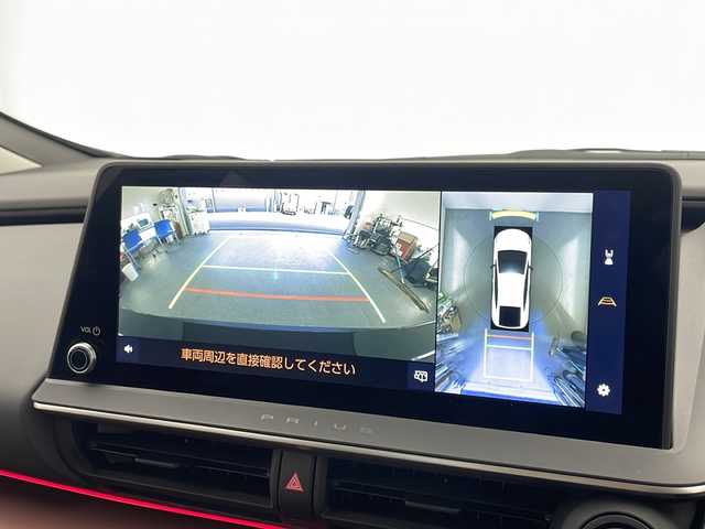 トヨタ プリウス Z 宮崎県 2024(令6)年 1.9万km アティチュードブラックマイカ 禁煙車/トヨタセーフティセンス/純正12.3型ディスプレイオーディオナビTV/（T-CONNECT/USB/HDMI/FMAM/Bluetooth/フルセグTV）/純正ビルトイン2.0ETC/純正19インチアルミ/純正LEDオートライト/純正フロアマット/プリクラッシュセーフティ/アダプティブクルーズコントロール/レーンディパーチャーアラート/オートマチックハイビーム/パーキングアシスト/クリアランスソナー/ブラインドスポットモニター/デジタルミラー/電子パーキング/オートホールド/パワーバックドア/AC100V/オートエアコン/前席シートヒーター/エアシート/運転席パワーシート/本革巻ハンドル/スマートキー/プッシュエンジンスタート/スペアキー/新車時保証書/取扱い説明書