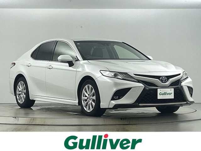 トヨタ カムリ WS 福岡県 2021(令3)年 8.3万km プラチナホワイトパールマイカ 禁煙車/純正8インチナビ/（AM/FM/フルセグTV/Bluetooth/USB)/バックカメラ/AC100V電源/トヨタセーフティセンス/・プリクラッシュセーフティ/・レーダークルーズコントロール/・レーンディパーチャーアラート/・オートマチックハイビーム/・クリアランスソナー/ブラインドスポットモニター/ETC/ドライブレコーダー/パワーシート/純正17インチアルミホイール/スマートキー/プッシュスタート/LEDヘッドライト/フロントフォグランプ/純正フロアマット/横滑り防止装置/電動格納ミラー/ステアリングスイッチ