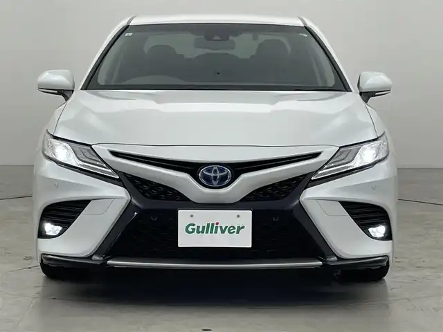 トヨタ カムリ WS 福岡県 2021(令3)年 8.3万km プラチナホワイトパールマイカ 純正８型ＤＡナビ／フルセグＴＶ　/バックカメラ　/ＥＴＣ　/前後ドラレコ　/レーダークルコン　/コーナーセンサー　/衝突軽減ブレーキ　/レーンキープ　/ＢＳＭ　/アクセル踏み間違い防止　/ハーフレザー　/パワーシート　/ＬＥＤヘッドライト