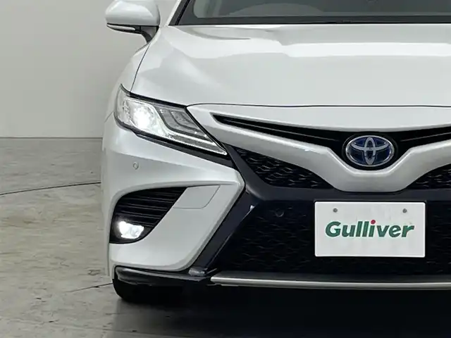 トヨタ カムリ WS 福岡県 2021(令3)年 8.3万km プラチナホワイトパールマイカ 純正８型ＤＡナビ／フルセグＴＶ　/バックカメラ　/ＥＴＣ　/前後ドラレコ　/レーダークルコン　/コーナーセンサー　/衝突軽減ブレーキ　/レーンキープ　/ＢＳＭ　/アクセル踏み間違い防止　/ハーフレザー　/パワーシート　/ＬＥＤヘッドライト