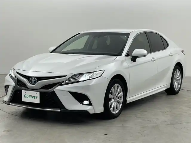 トヨタ カムリ WS 福岡県 2021(令3)年 8.3万km プラチナホワイトパールマイカ 純正８型ＤＡナビ／フルセグＴＶ　/バックカメラ　/ＥＴＣ　/前後ドラレコ　/レーダークルコン　/コーナーセンサー　/衝突軽減ブレーキ　/レーンキープ　/ＢＳＭ　/アクセル踏み間違い防止　/ハーフレザー　/パワーシート　/ＬＥＤヘッドライト