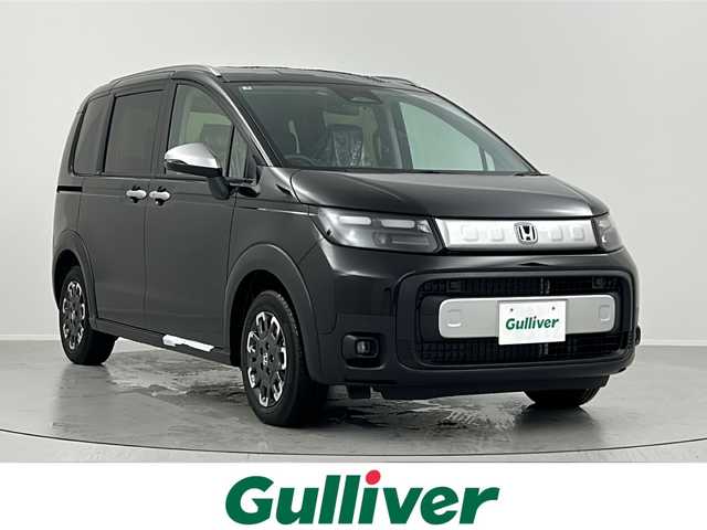 ホンダ フリード ハイブリット e:HEV クロスター 福島県 2025(令7)年 0.1千km クリスタルブラックパール /登録済未使用車//4WD//ホンダセンシング/・衝突軽減ブレーキ/・路外逸脱抑制機能/・先行車発進お知らせ機能/・アダプティブクルーズコントロール/・車線維持支援システム/・パーキングセンサー//ブラインドスポットモニター//マルチビューカメラシステム//メーカーOP9型ナビ/・BT.スマホ連携/・フルセグTV//両側パワースライドドア//前席シートヒーター//プッシュスタート//スマートキー×2//電動パーキングブレーキ//ブレーキホールド//LEDヘッドライト//LEDフォグライト//ステアリングスイッチ//純正15インチAW//ワイパーデアイサー