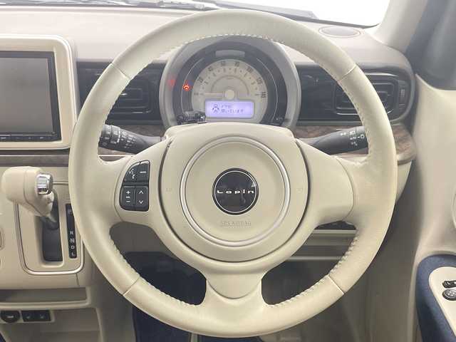 スズキ ラパン モード 栃木県 2021(令3)年 1万km ノクターンブルーパール 純正ナビ/（CD/DVD/Bluetooth/フルセグTV/MSV）/スズキセーフティサポート/・デュアルセンサーブレーキサポート/・誤発進抑制機能/・車線逸脱抑制機能/・車線逸脱警報機能/・ふらつき警報機能/・先行車発進お知らせ機能/前席シートヒーター/コーナーセンサー/プッシュスタート/スマートキー/フロアマット