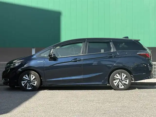 ホンダ シャトル ハイブリッド X ホンダセンシング 千葉県 2021(令3)年 5万km ミッドナイトブルービームM 純正8インチインターナビ（（VXM-217VFEi）/フルセグ/バックカメラ/前後ドラレコ/ETC/前席シートヒーター/パドルシフト/ハーフレザー/ホンダセンシング/レーダークルーズコントロール/LEDライト