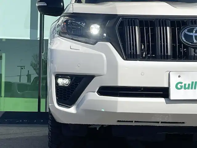 トヨタ ランドクルーザー プラド TX Lパッケージ マットブラED 和歌山県 2023(令5)年 7.1万km ホワイトパールクリスタルシャイン 純正9インチナビ/全方位カメラ/フルセグTV/衝突軽減ブレーキ/レーダークルコン/ブラインドスポットモニター/前後コーナーセンサー/オートライト/ビルトインETC2.0/シートヒーター/シートベンチレーション/パワーシート/ルーフレール/LEDヘッドライト/フォグランプ/電格ミラー