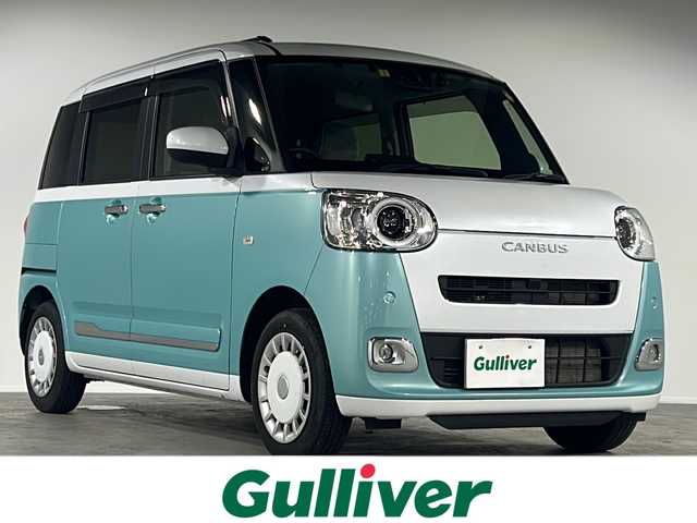 ダイハツ ムーヴ キャンバス ストライプス G 福岡県 2023(令5)年 1.9万km シャイニングホワイトパール/ファインミントメタリック 純正メモリナビ/フルセグテレビ/バックカメラ/ドライブレコーダー/シートヒーター/両側パワースライドドア/ETC/電子パーキング/アイドリングストップ/衝突軽減ブレーキ/純正フロアマット/純正LEDヘッドライト