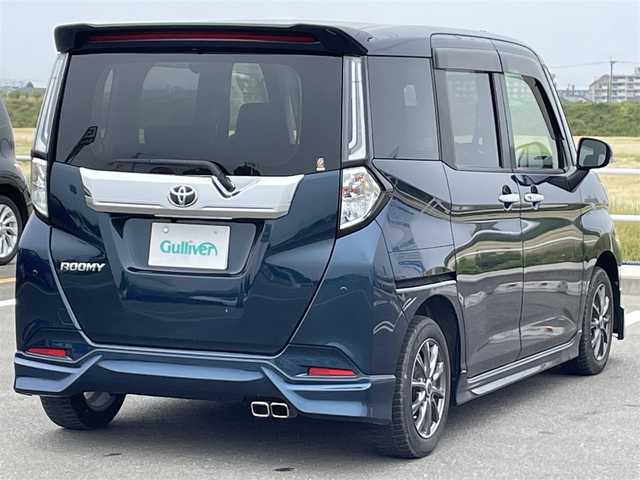 トヨタ ルーミー カスタムG 佐賀県 2021(令3)年 1万km レーザーブルークリスタルシャイン モデリスタエアロ/スマートアシストIII/・レーダークルーズコントロール/・衝突回避支援ブレーキ/・車線逸脱警報/・誤発進抑制制御/・先行車発進お知らせ機能/・標識認識機能/・ふらつき警報/純正9型ディスプレイオーディオ/・TV Bluetooth USB/全方位カメラ/前後ドライブレコーダー/両側パワースライドドア/電子パーキング/ブレーキホールド機能/D＋N席シートヒーター/後席用サイドサンシェード/ISOFIX/ステアリングリモコン/純正LEDヘッドライト/フォグライト/オートハイビーム/プッシュスタート/スマートキー