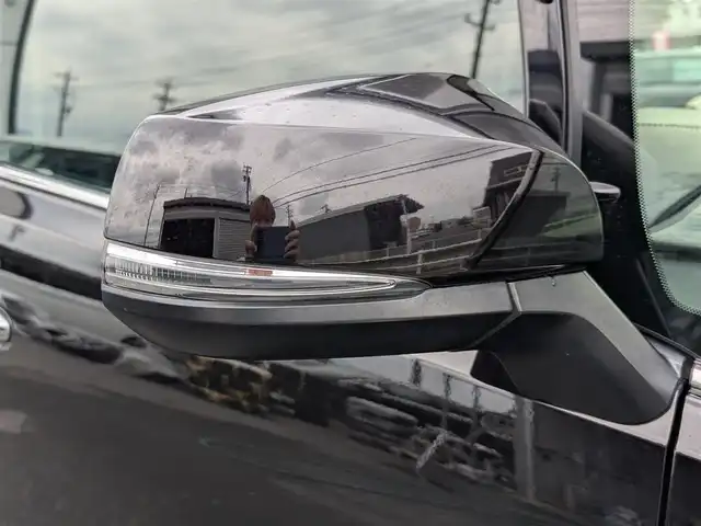 トヨタ ヴェルファイア Z Gエディション 福井県 2015(平27)年 8.9万km バーニングブラッククリスタルシャインガラスフレーク 純正18インチAW/ビルトインETC/レーダークルーズコントロール/衝突被害軽減システム/アイドリングストップ/１００V充電/後席用フリップダウンモニター/前席パワーシート/ステアリングヒーター/オットマン/電動リアゲート/両側パワースライドドア/前方ドライブレコーダー/前後コーナーセンサー/純正10インチメモリナビ（CD/DVD/BT/USB）/横滑り防止装置/盗難防止装置/LEDヘッドライト/スタッドレスタイヤ積込/社外シートカバー/オートホールド