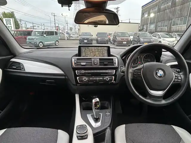 ＢＭＷ １１８ｉ スタイル 愛知県 2015(平27)年 9.1万km アルピンホワイトⅢ 純正メモリナビ/バックカメラ/アイドリングストップ/ウィンカーミラー/クルーズコントロール/プッシュスタート/ETC/ハーフレザーシート