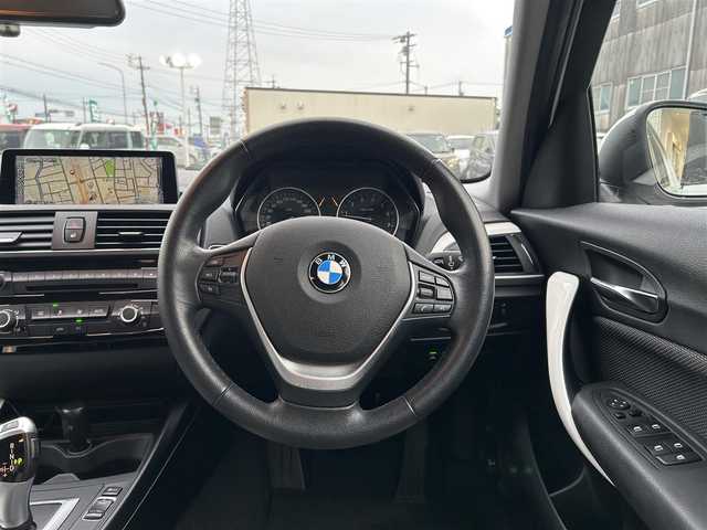 ＢＭＷ １１８ｉ スタイル 愛知県 2015(平27)年 9.1万km アルピンホワイトⅢ 純正メモリナビ/バックカメラ/アイドリングストップ/ウィンカーミラー/クルーズコントロール/プッシュスタート/ETC/ハーフレザーシート