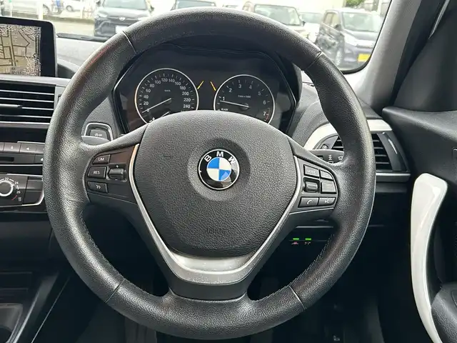 ＢＭＷ １１８ｉ スタイル 愛知県 2015(平27)年 9.1万km アルピンホワイトⅢ 純正メモリナビ/バックカメラ/アイドリングストップ/ウィンカーミラー/クルーズコントロール/プッシュスタート/ETC/ハーフレザーシート