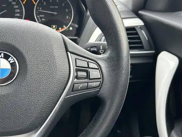 ＢＭＷ １１８ｉ スタイル 愛知県 2015(平27)年 9.1万km アルピンホワイトⅢ 純正メモリナビ/バックカメラ/アイドリングストップ/ウィンカーミラー/クルーズコントロール/プッシュスタート/ETC/ハーフレザーシート