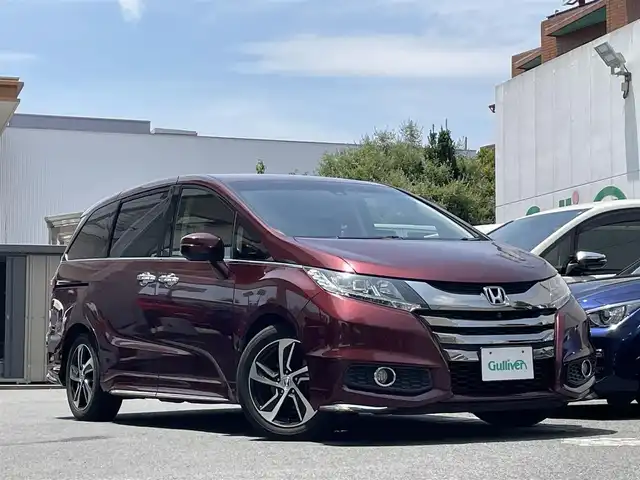 ホンダ オデッセイ アブソルート・Xホンダセンジング 東京都 2016(平28)年 8.7万km プレミアムディープロッソパール ワンオーナー/純正SDナビ/・フルセグTV/・Bluetooth接続/・AM＆FM/後席用フリップダウンモニター/両側パワースライドドア/ハーフレザーシート/ホンダセンシング/バックカメラ/全周囲カメラ/ドラレコ/ETC/レーダークルーズコントロール/ABS/横滑り防止/レーンアシスト/LEDライト/オートライト/スマートキー/保証書＆取扱説明書
