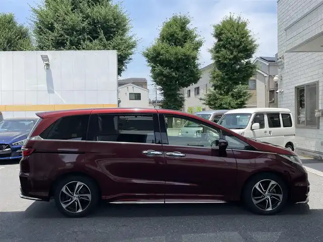 ホンダ オデッセイ アブソルート・Xホンダセンジング 東京都 2016(平28)年 8.7万km プレミアムディープロッソパール ワンオーナー/純正SDナビ/・フルセグTV/・Bluetooth接続/・AM＆FM/後席用フリップダウンモニター/両側パワースライドドア/ハーフレザーシート/ホンダセンシング/バックカメラ/全周囲カメラ/ドラレコ/ETC/レーダークルーズコントロール/ABS/横滑り防止/レーンアシスト/LEDライト/オートライト/スマートキー/保証書＆取扱説明書