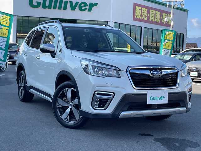 スバル フォレスター ハイブリッド アドバンス 長野県 2018(平30)年 2.3万km クリスタルホワイトP アイサイト/カロッツェリア８インチナビ（AVIC-RL802）/FM・AM・DVD・CD・フルセグテレビ/Bluetooth Audio/バック・サイドカメラ/純正18インチアルミホイール/レーダークルーズコントロール/スマートリアビューミラー/革巻きステアリング/ステアリングヒーター/ハーフレザーシート/全席シートヒーター/前席パワーシート/シートメモリー/コーナーセンサー/電動パーキング/オートビークルホールド/パドルシフト/ルーフレール/LEDヘッドライト/オートライト/フォグランプ/プッシュスタート/スマートキー/スペアキー/ETC