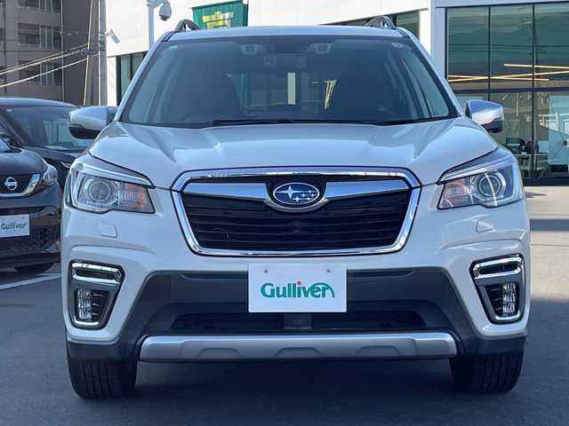 スバル フォレスター ハイブリッド アドバンス 長野県 2018(平30)年 2.3万km クリスタルホワイトP アイサイト/カロッツェリア８インチナビ（AVIC-RL802）/FM・AM・DVD・CD・フルセグテレビ/Bluetooth Audio/バック・サイドカメラ/純正18インチアルミホイール/レーダークルーズコントロール/スマートリアビューミラー/革巻きステアリング/ステアリングヒーター/ハーフレザーシート/全席シートヒーター/前席パワーシート/シートメモリー/コーナーセンサー/電動パーキング/オートビークルホールド/パドルシフト/ルーフレール/LEDヘッドライト/オートライト/フォグランプ/プッシュスタート/スマートキー/スペアキー/ETC