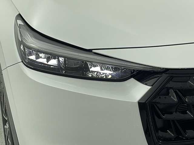 ホンダ ヴェゼル ハイブリッド e:HEV Z 愛知県 2025(令7)年 0.1万km未満 プラチナホワイトパール 登録時走行距離　5km/登録済未使用車/Honda SENSING/●衝突軽減ブレーキ/●先行車発進お知らせ機能/●歩行者事故低減ステアリング/●路外逸脱抑制機能/●標識認識機能/●渋滞追従機能付アダプティブクルーズコントロール/●車線維持支援システム/●トラフィックジャムアシスト/●ブラインドスポットインフォメーション/●誤発進抑制機能/●後方誤発進抑制機能/●近距離衝突軽減ブレーキ/●急アクセル抑制機能/●パーキングセンサーシステム/●後退出庫サポート/●オートハイビーム/●アダプティブドライビングビーム/Honda CONNECTディスプレイオーディオ/・AM/FM/USB/・AppleCarPlay/AndroidAuto/・Bluetooth/・フルセグTV/バックカメラ/ステアリングスイッチ/本革巻きステアリング/ETC2.0/前席シートヒーター/ハンズフリーアクセスパワーテールゲート/LEDシーケンシャルターンシグナルランプ/オートマチックヘッドライト/フォグランプ/ワイヤレス充電器/USB充電【type-C】/フロントグリル【ベルリナブラック】/純正18インチアルミホイール