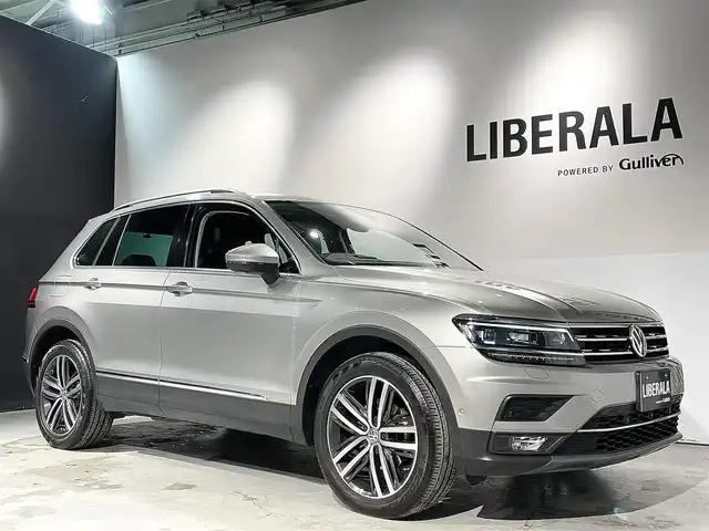 フォルクスワーゲン ティグアン TDI 4モーション ハイライン 道央・札幌 2020(令2)年 2.6万km タングステンシルバーメタリック Volkswagenオールインセーフティ/・アダプティブクルーズコントロール/・レーンキープアシストシステム/・レーンチェンジアシストシステム/・ダイナミックコーナリングライト/・ダイナミックライトアシスト/・アラウンドビューカメラ/・駐車支援システム/・パークディスタンスコントロール/・プリクラッシュブレーキシステム/・リアトラフィックアラート/・プロアクティブ オキュバントプロテクション/・ブレーキアシスト/純正ナビ(DiscoverPro)/・SSDナビゲーション/・TVチューナー/・CD/DVD/BT/USB/ヘッドアップディスプレイ/オートホールド機能/パワーテールゲート/パドルシフト/4MOTIONアクティブコントロール/インテリアアンビエントライト/デジタルメータークラスター/Highline専用クロームパッケージ/デュアルエキゾーストパイプ/レザーシート/メモリー付パワーシート/ランバーサポート/シートヒーター(全席)/レザーシフトノブ/社外ドライブレコーダー