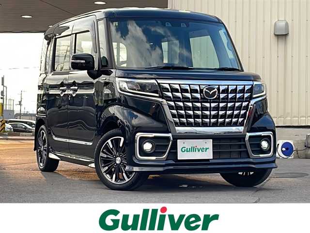 マツダ フレアワゴン カスタムスタイル ハイブリッド XG 道北・旭川 2023(令5)年 2.5万km ブルーイッシュブラックパール3 ・４ＷＤ/・禁煙車/・マイルドハイブリッド/・デュアルカメラブレーキサポート/　車線逸脱警報機能/　ハイビームアシスト機能/　前・後退時誤発進抑制機能/　リアパーキングセンサー/　後退時ブレーキサポート/　追従型クルーズコントロール/・社外メモリーナビCN-FZ886/　ＣＤ・ＢＴ・ＣＤ・ＤＶＤ/・バックカメラ/・ステアリングリモコン/・スマートキー/・両側パワースライドドア/・ドアミラーヒーター/・前席シートヒーター/・ハーフレザーシート/・LEDオートライト/・ヘッドアップディスプレイ/・純正１５インチアルミ/・リアサーキュレーター/・リアロールサンシェード/・ETC/・新車時保証書/・取説