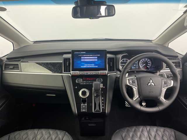 三菱 デリカＤ：５ ブラックエディション 愛知県 2025(令7)年 0.1千km ホワイトダイヤモンド 登録済未使用車/アルパイン１１型ナビ（EX11NX）/・カープレイ/・フルセグTV/・CD/DVD/・Bluetooth接続/・HDMI入力/バックカメラ/ブラインドスポットモニター/レーダークルーズコントロール/ＡＣ１００Ｖアクセサリーコンセント/ステアリングヒーター/パドルシフト/前席シートヒーター/本革シート/パワーシート/両側パワースライドドア/純正アルミホイール/電動ブレーキ/オートホールド