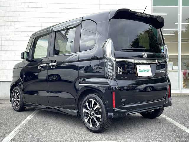 ホンダ Ｎ ＢＯＸ カスタム G L ホンダセンシング 鳥取県 2018(平30)年 7.6万km クリスタルブラックパール Honda SENSING/・車線維持支援システム/・追突軽減ブレーキ/。衝突軽減ブレーキ/・誤発進抑制機能/・後方誤発進抑制機能/・歩行者事故低減ステアリング/・路外逸脱抑制機能/・アダプティブ・クルーズ・コントロール/・車線維持支援システム/・オートハイビーム/・先行車発進お知らせ機能/・標識認識機能/ナビ装着用スペシャルパッケージ/・リアワイドカメラ/・HDDナビAVN660HDmkII/・ビルトインETC/・オーディオリモートコントロールスイッチ/・ハンズフリーテレホンスイッチ/・音声認識スイッチ/プラズマクラスター技術搭載フルオート・エアコンディショナー/リア左側パワースライドドア/フルセグTV　Bluetooth　DVD CD　MSV/オートリトラミラー/LEDライト/フォグランプ/ブラック塗装＋切削 14インチアルミホイール/オートライト/スマートキー/スペアキー/フロアマット/ドアバイザー/前席用i-サイドエアバッグシステム＋サイドカーテンエアバッグシステム/新車保証書/取扱説明書