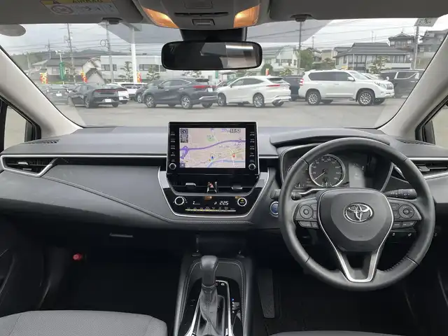 トヨタ カローラ ハイブリット S 岡山県 2022(令4)年 1万km プラチナホワイトパールマイカ 純正ディスプレイオーディオ　/AM、FM、Bluetooth/AppleCarplay、AndroidAuto/バックカメラ/前席シートヒーター/ステアリングヒーター/トヨタセーフティセンス/・プリクラッシュセーフティ/・レーントレーシングアシスト/・レーダークルーズコントロール/・オートマチックハイビーム/・ロードサインアシスト/車両接近通報装置