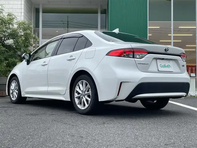トヨタ カローラ ハイブリット S 岡山県 2022(令4)年 1万km プラチナホワイトパールマイカ 純正ディスプレイオーディオ　/AM、FM、Bluetooth/AppleCarplay、AndroidAuto/バックカメラ/前席シートヒーター/ステアリングヒーター/トヨタセーフティセンス/・プリクラッシュセーフティ/・レーントレーシングアシスト/・レーダークルーズコントロール/・オートマチックハイビーム/・ロードサインアシスト/車両接近通報装置