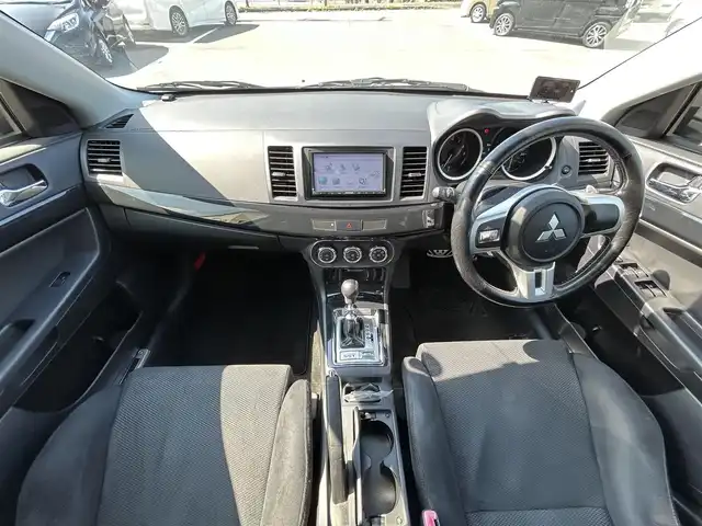 三菱 ランサー GSR エボリューションⅩ 愛媛県 2015(平27)年 14.2万km シルキーホワイト KENWOOD7型ナビ(AM/FM/フルセグTV)/RECARO製フルバケットシート/ENKEI製18インチ鋳造アルミホイール/ツインクラッチSST/パドルシフト/TEIN車高調/brembo製ブレーキキャリパー/ツイステッドウイングタイプ大型リヤスポイラー/本革巻3本スポークステアリングホイール/S-AWC/ドライブレコーダー/ASSURAレーダー探知機(AR-252GA) /BRIDGESTONEタイヤ空気圧モニタリングシステム/電格ミラー/ISOFIX/オートライト/現状サマー(純正AW)(245/40/R18)/YOKOHAMA ADVAN NEOVA AD09