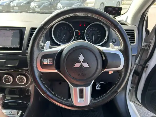 三菱 ランサー GSR エボリューションⅩ 愛媛県 2015(平27)年 14.2万km シルキーホワイト KENWOOD7型ナビ(AM/FM/フルセグTV)/RECARO製フルバケットシート/ENKEI製18インチ鋳造アルミホイール/ツインクラッチSST/パドルシフト/TEIN車高調/brembo製ブレーキキャリパー/ツイステッドウイングタイプ大型リヤスポイラー/本革巻3本スポークステアリングホイール/S-AWC/ドライブレコーダー/ASSURAレーダー探知機(AR-252GA) /BRIDGESTONEタイヤ空気圧モニタリングシステム/電格ミラー/ISOFIX/オートライト/現状サマー(純正AW)(245/40/R18)/YOKOHAMA ADVAN NEOVA AD09