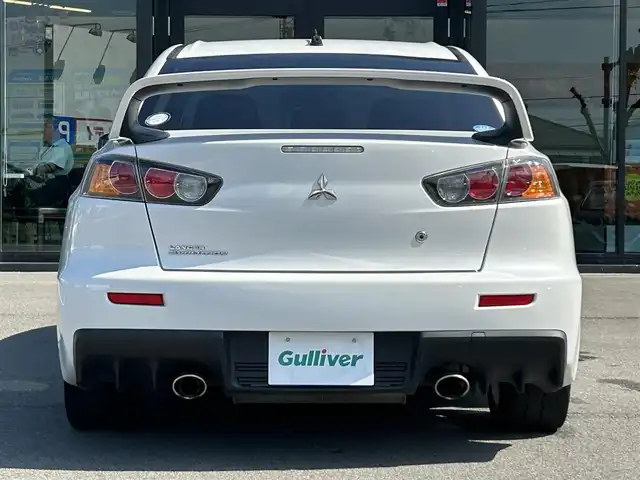 三菱 ランサー GSR エボリューションⅩ 愛媛県 2015(平27)年 14.2万km シルキーホワイト KENWOOD7型ナビ(AM/FM/フルセグTV)/RECARO製フルバケットシート/ENKEI製18インチ鋳造アルミホイール/ツインクラッチSST/パドルシフト/TEIN車高調/brembo製ブレーキキャリパー/ツイステッドウイングタイプ大型リヤスポイラー/本革巻3本スポークステアリングホイール/S-AWC/ドライブレコーダー/ASSURAレーダー探知機(AR-252GA) /BRIDGESTONEタイヤ空気圧モニタリングシステム/電格ミラー/ISOFIX/オートライト/現状サマー(純正AW)(245/40/R18)/YOKOHAMA ADVAN NEOVA AD09